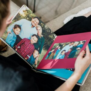 whcc_open-spread-family-album_lifestyle_woman-on-couch